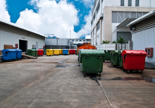 Business office with waste bins for recycling and general waste