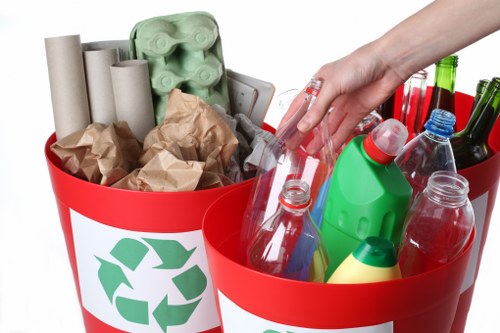 Eco-friendly rubbish removal truck in action